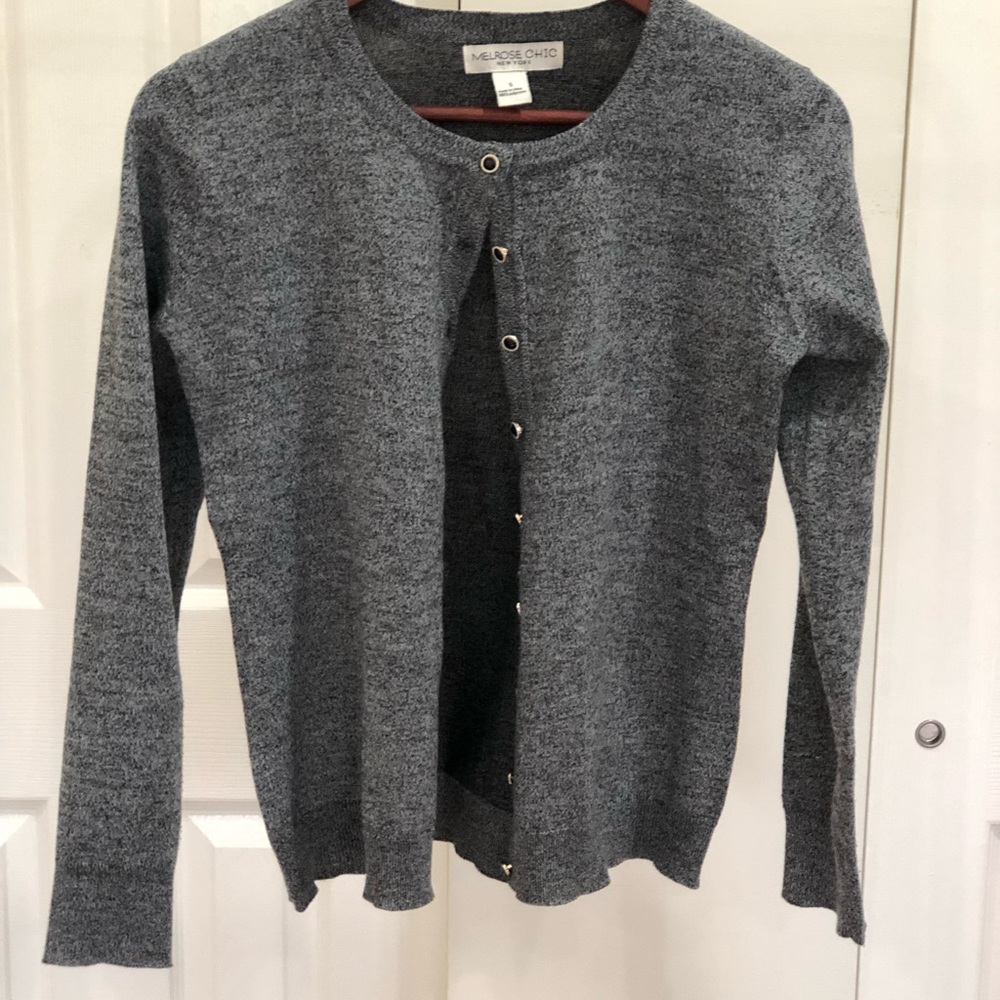 Long sleeve gray sweater.